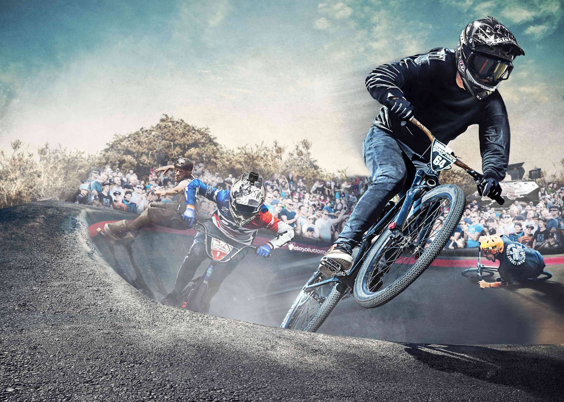 Riders carving a pumptrack berm